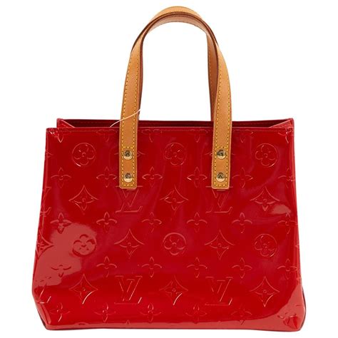 louis vuitton red bottom bag